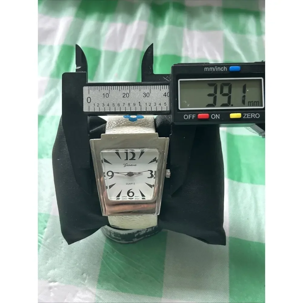 Geneva Silver Tone Multicolored Band Women’s Cuff Watch
